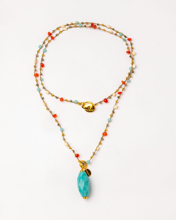 Collar velatti de lino con piedra azul